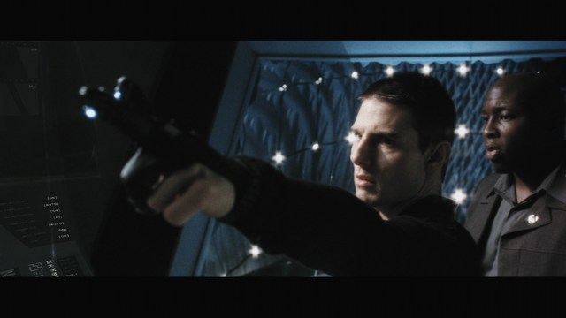 A person holding a newspaper article titled 'Mooby: Creating an Empire Out of Simplicity' featuring a chart showing growth, alongside an image of a cartoon cow.