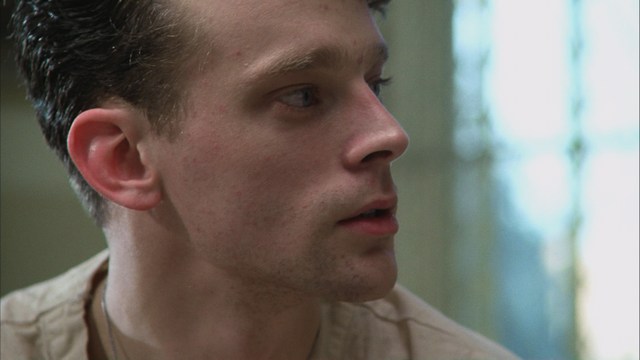 Three characters looking down in shock or concern, with a snowy background.